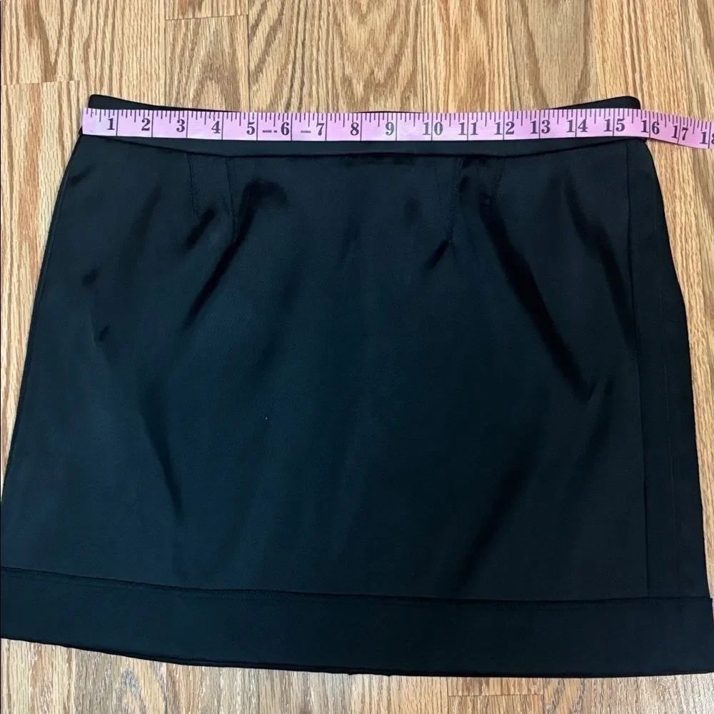 Juicy Couture Black Satin Mini Skirt, exposed seams, zipper, 10 - Picture 7 of 10